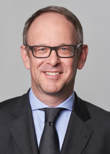 DR. FRANK KEBEKUS